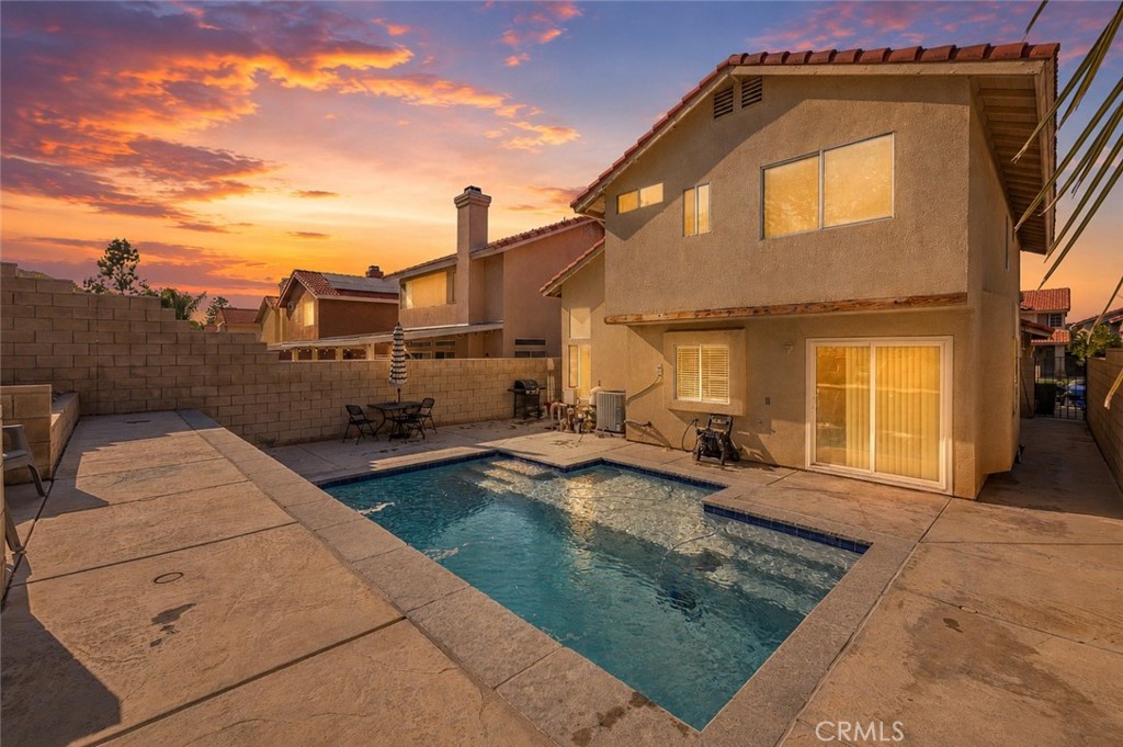 15417 Tobarra Road Fontana, CA 92337 - Photo 1 of 29 a view of a house with sitting area