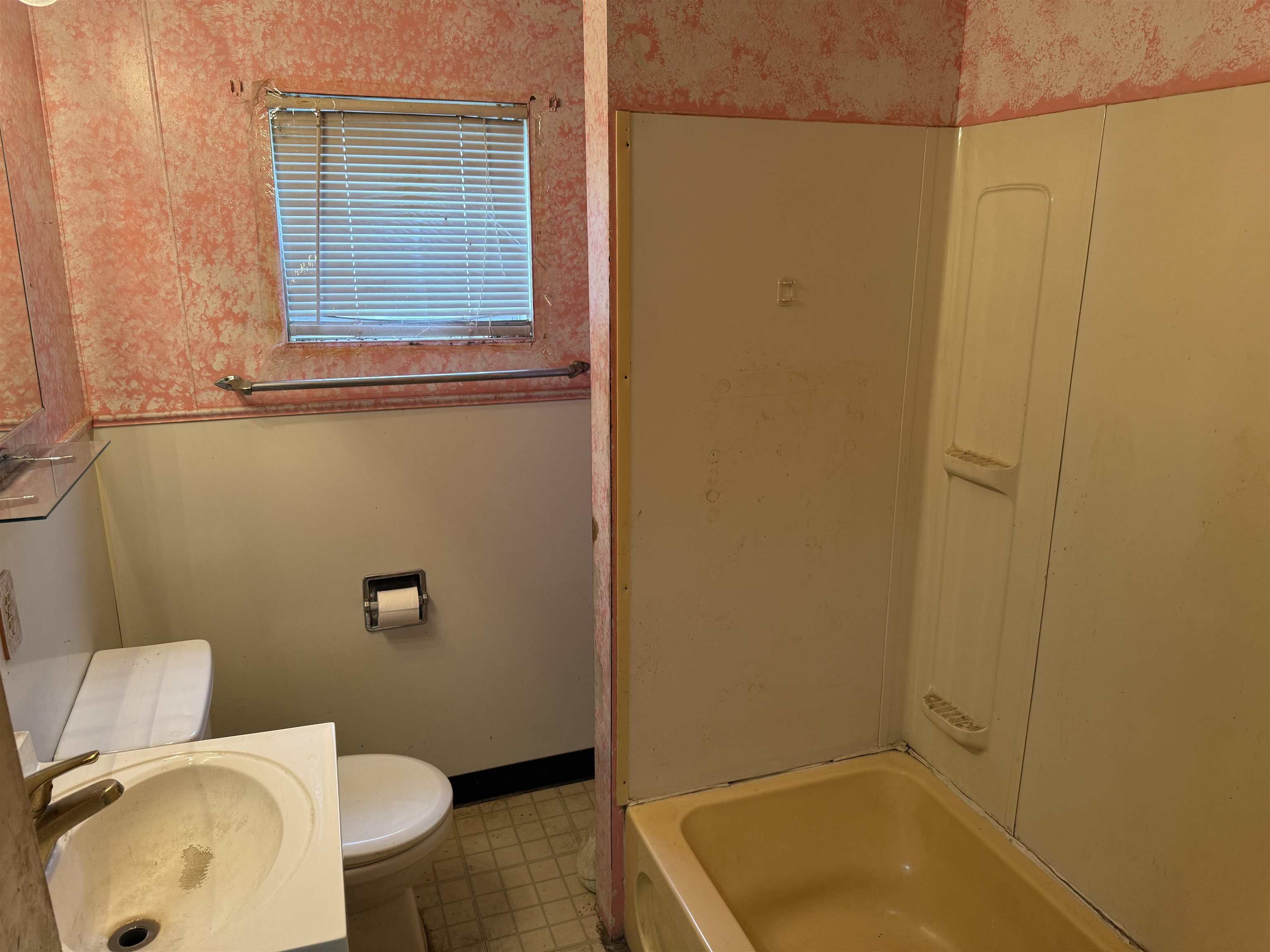 1473 South Float Avenue Freeport, IL 61032 - Photo 11 of 14 a bathroom with a sink and a toilet