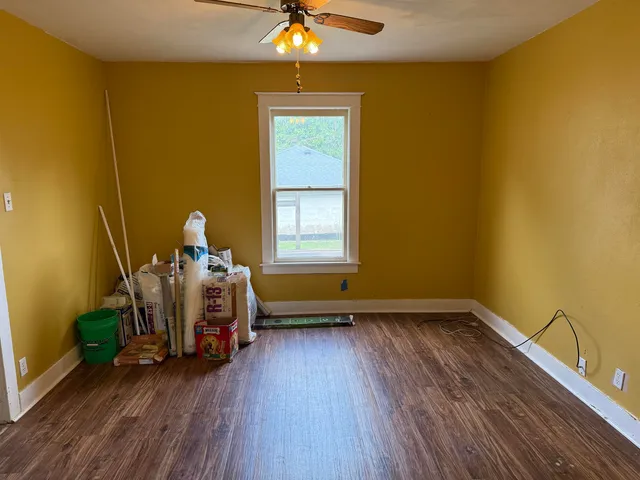 a view of livingroom with furniture and wooden floor