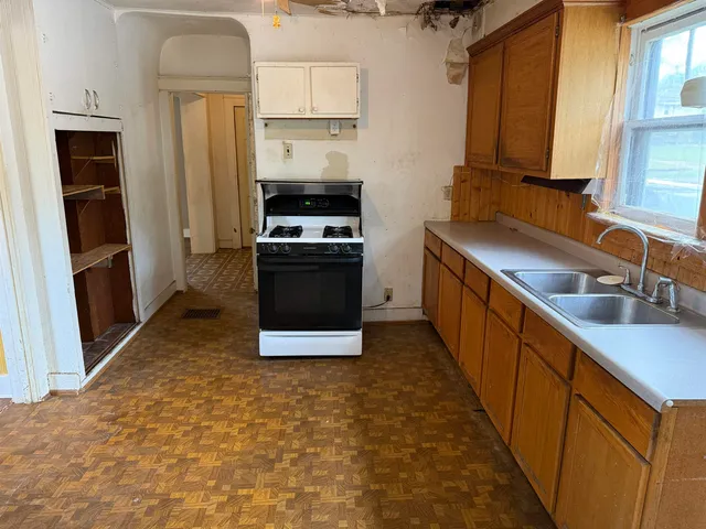 a view of outdoor space and wooden floor