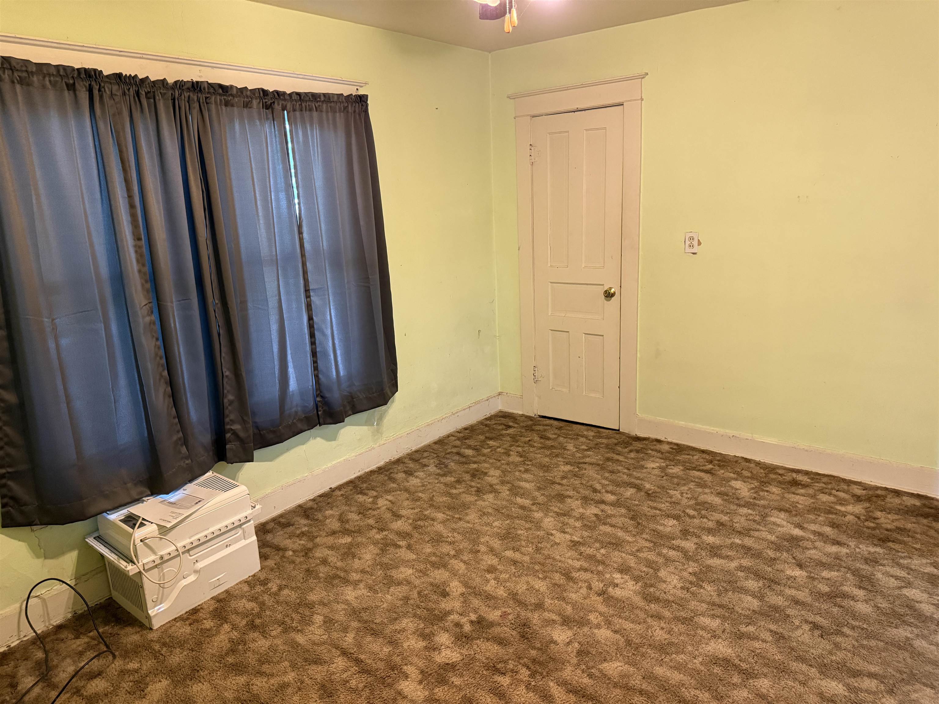 1473 South Float Avenue Freeport, IL 61032 - Photo 9 of 14 a view of room with stairs and wooden floor