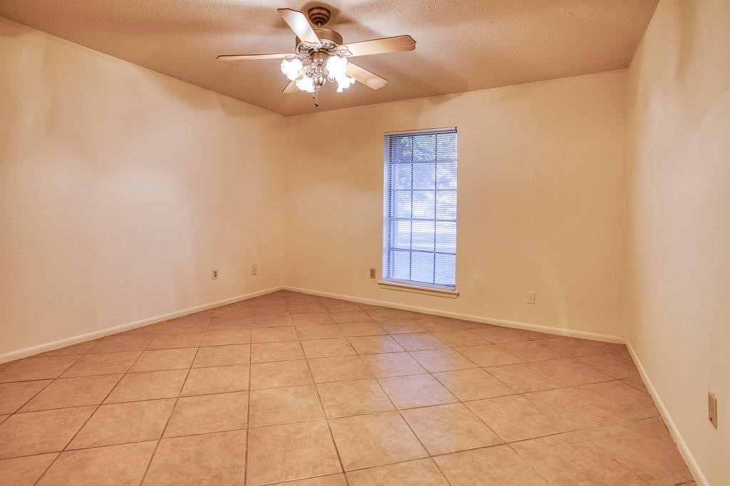 102 Timber Trail Circle Portland, TX 78374 - Photo 20 of 28 a view of an empty room with a window