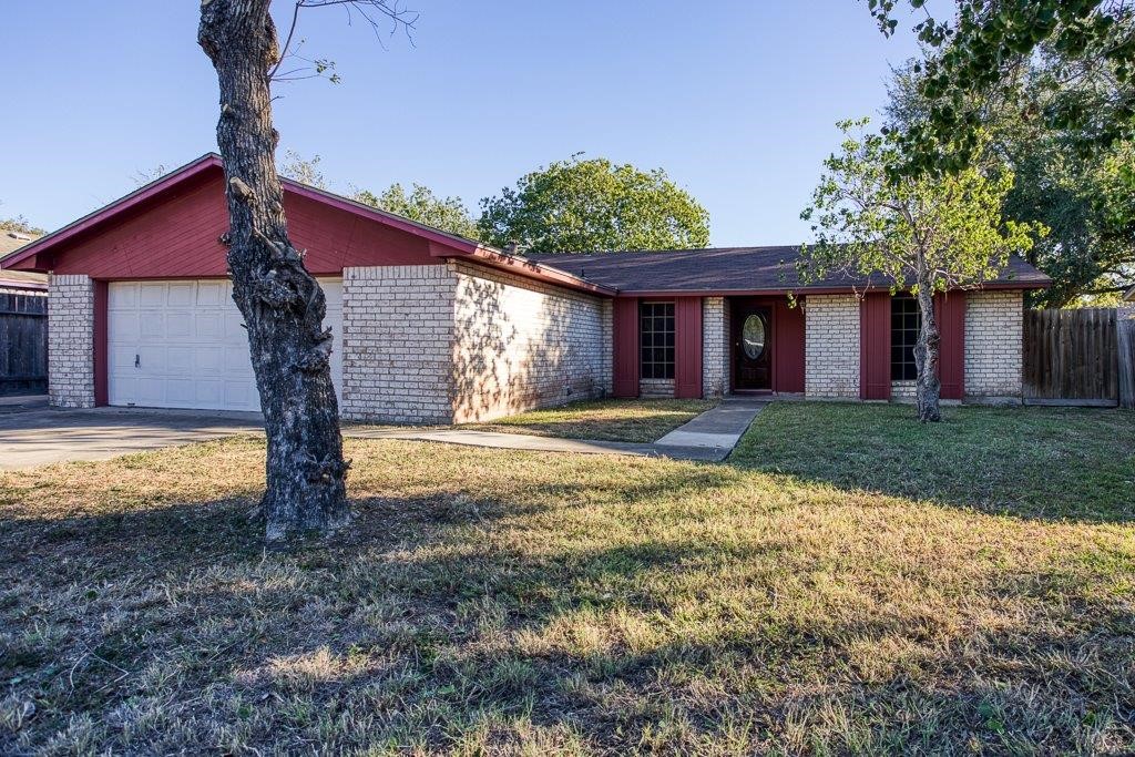 102 Timber Trail Circle Portland, TX 78374 - Photo 2 of 28 a house view with a garden space