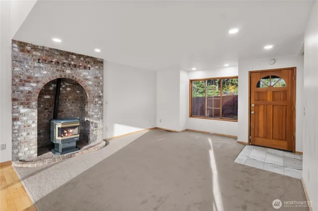 a view of spacious bathroom with a tub and sink