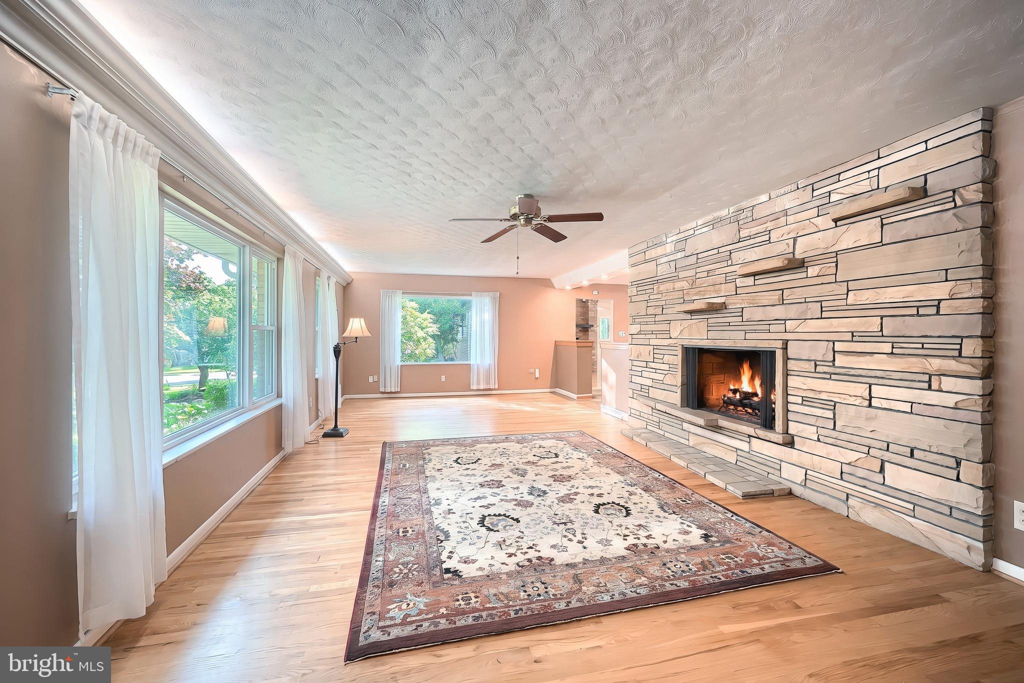 2850 Iron Stone Hill Road York, PA 17403 - Photo 20 of 61 Huge living room with stone fireplace