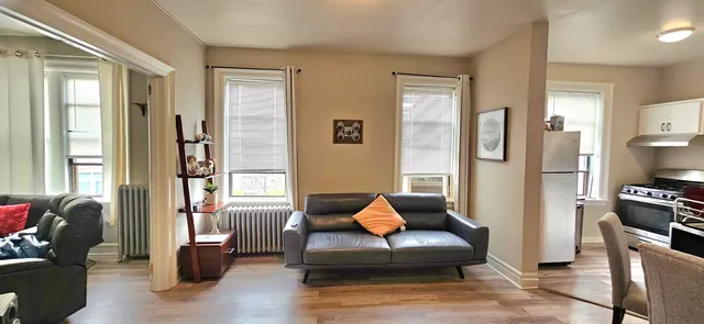 a living room with furniture or couch and a window