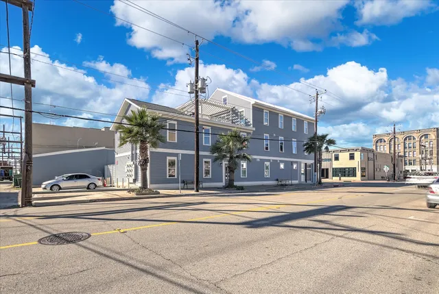 a view of a building with a street