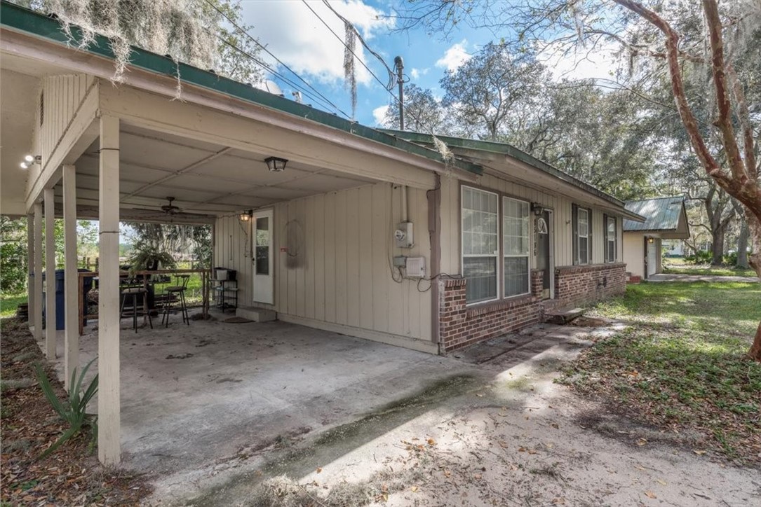 85186 Winona Bayview Road Yulee, FL 32097 - Photo 3 of 24 a view of a house with backyard