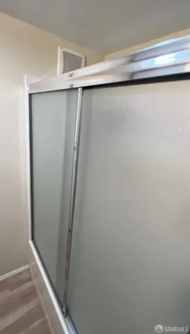 a bathroom with a toilet sink and vanity