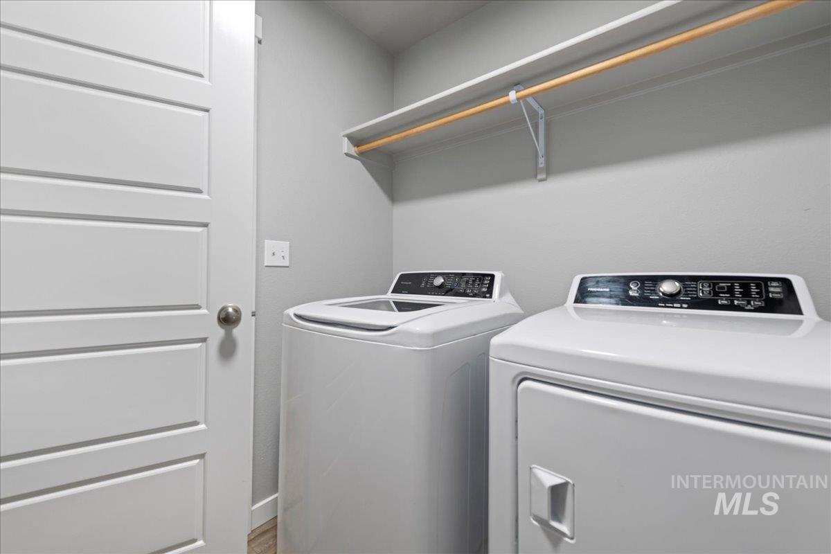2513 East Goldstone Street Meridian, ID 83642 - Photo 18 of 27 Laundry room featuring separate washer and dryer