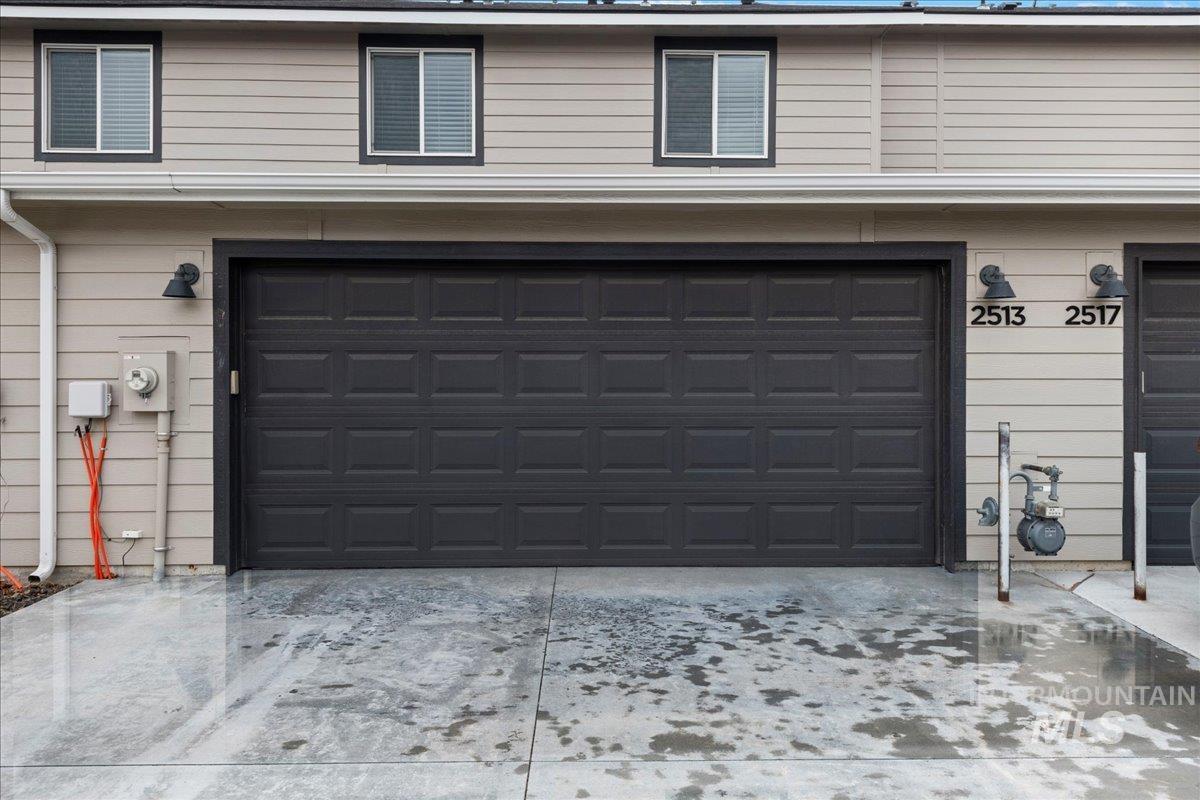 2513 East Goldstone Street Meridian, ID 83642 - Photo 4 of 27 Garage featuring driveway