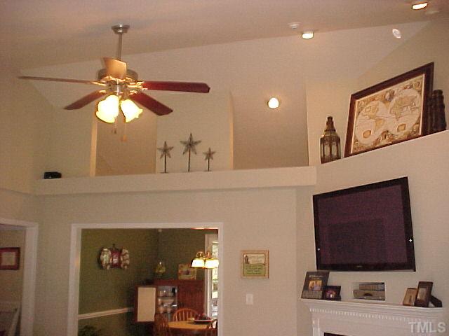 7219 Sunset View Court Willow Spring, NC 27592 - Photo 12 of 24 VAULTED CEILINGS AND CANNED LIGHTING