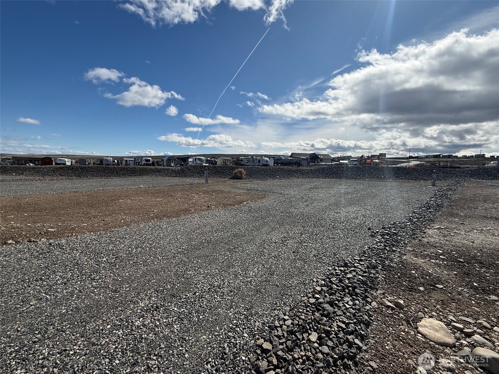 1769 Naches Wenas Road, Unit 144 Selah, WA 98942 - Photo 4 of 12 a view of a lake with sunset