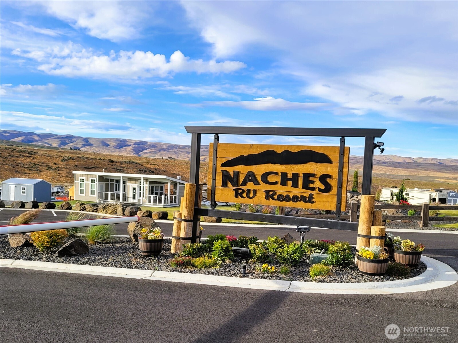 1769 Naches Wenas Road, Unit 144 Selah, WA 98942 - Photo 6 of 12 a sign on the side of a building