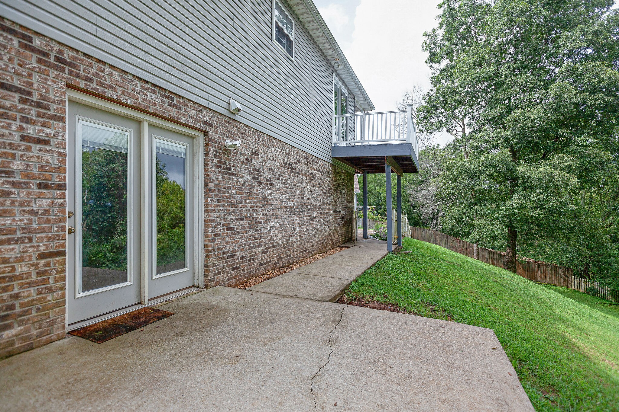 3668 Rutherford Drive Spring Hill, TN 37174 - Photo 27 of 31 a view of a house with a yard