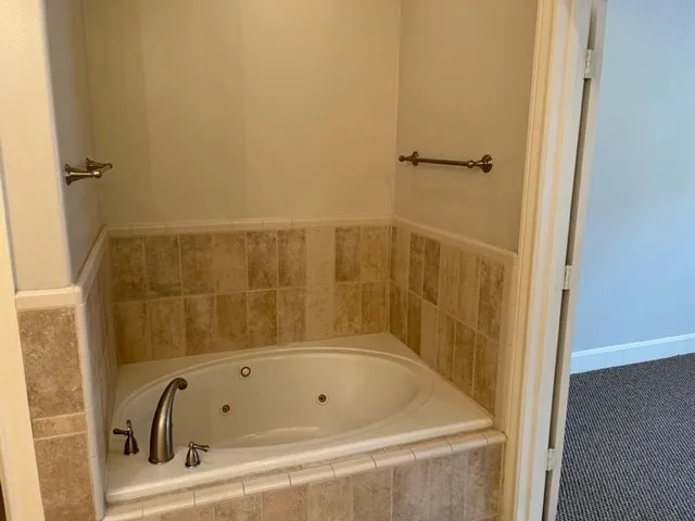 a view of a bathroom with a glass door