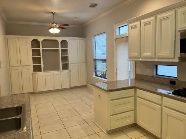 a bathroom with a sink a vanity and a mirror