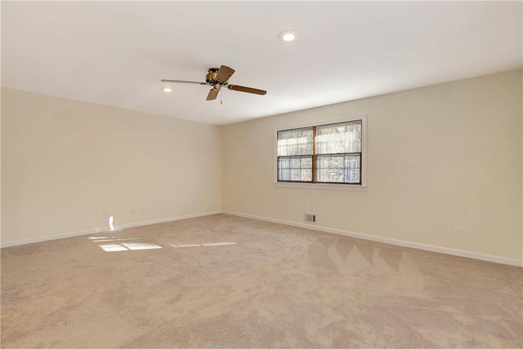 10185 Henry Mill Road Chattahoochee Hills, GA 30213 - Photo 11 of 41 a view of an empty room with a window