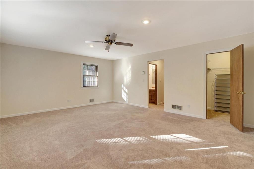 10185 Henry Mill Road Chattahoochee Hills, GA 30213 - Photo 13 of 41 a view of an empty room with a window