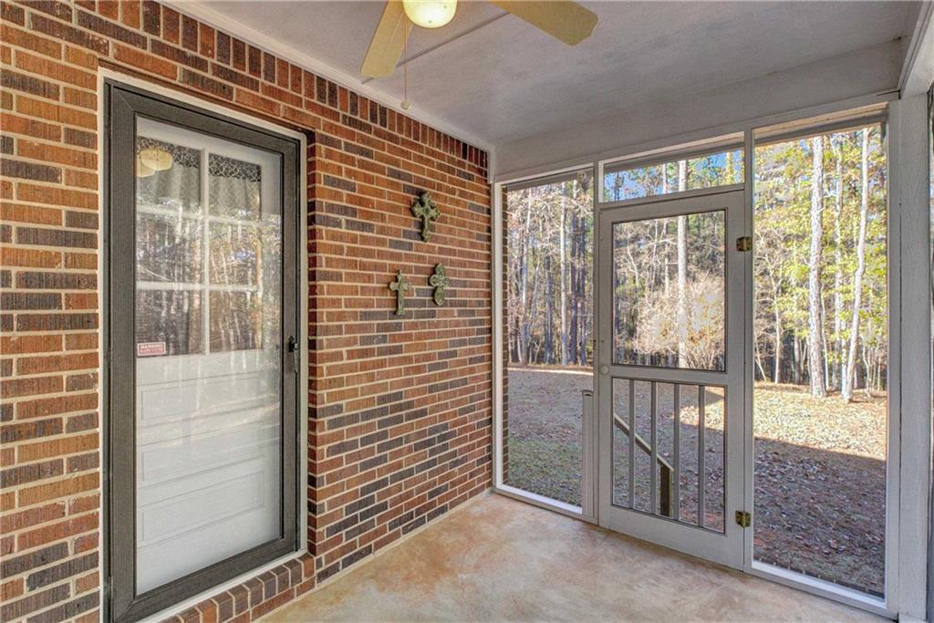 10185 Henry Mill Road Chattahoochee Hills, GA 30213 - Photo 2 of 41 a view of a room that has a large window