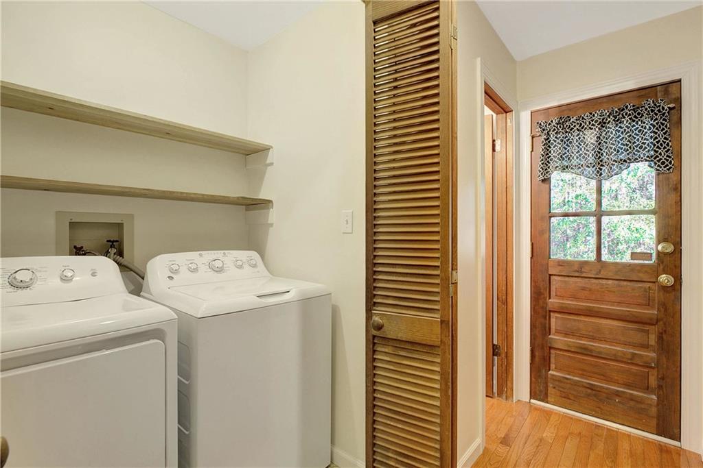 10185 Henry Mill Road Chattahoochee Hills, GA 30213 - Photo 23 of 41 a utility room with dryer and washer