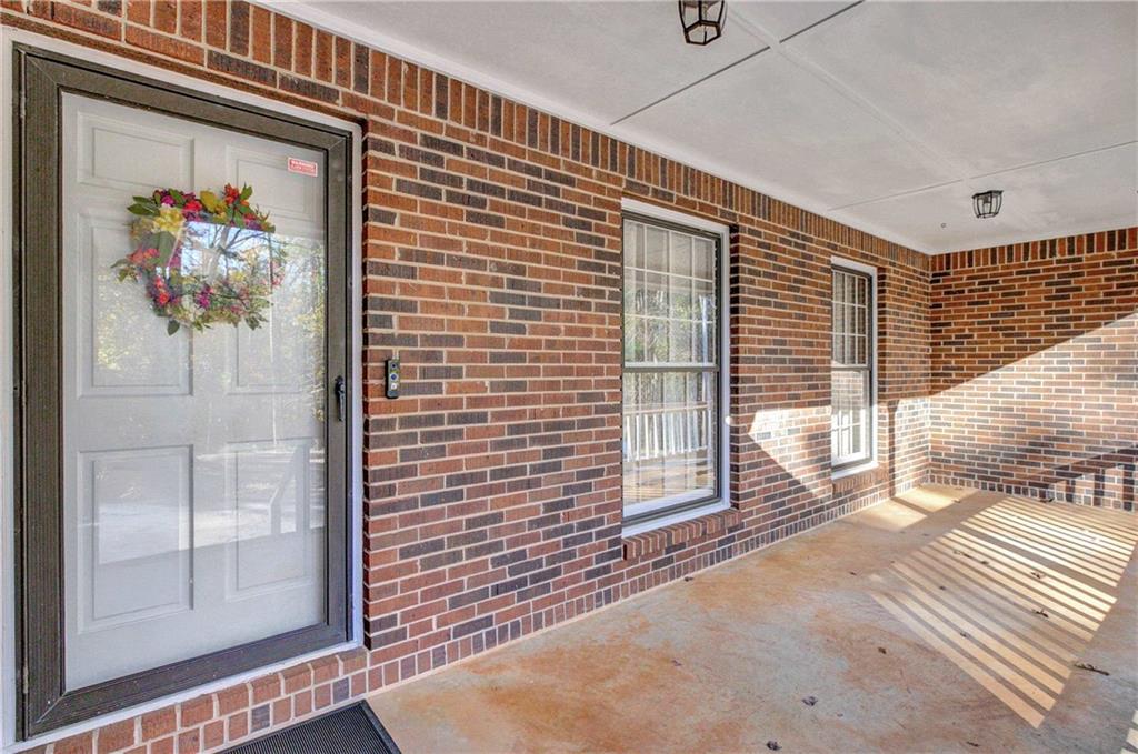 10185 Henry Mill Road Chattahoochee Hills, GA 30213 - Photo 29 of 41 a view of a entryway door of the house