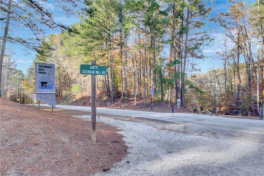 10185 Henry Mill Road Chattahoochee Hills, GA 30213 - Photo 41 of 41 a view of a road with large trees