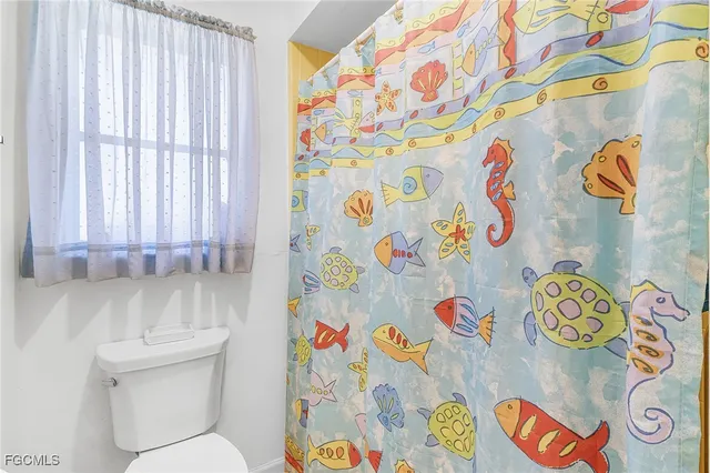 a bathroom with a vanity and a toilet