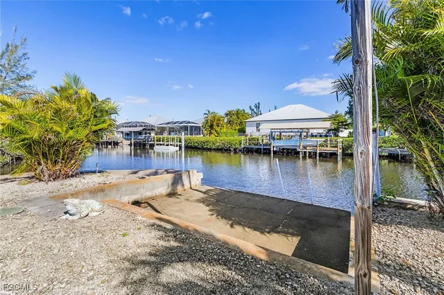 a view of a lake with a house