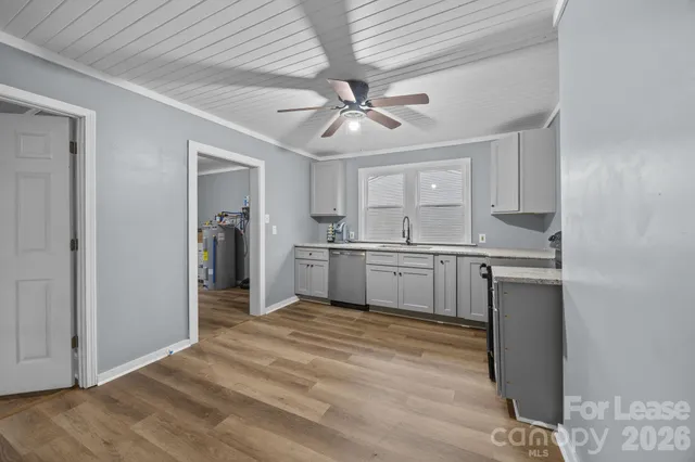 a kitchen with a refrigerator a sink and dishwasher