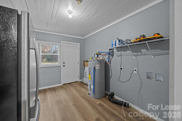 a view of a storage & utility room with closet