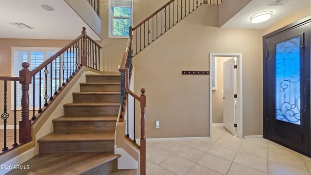 a view of entryway with wooden floor