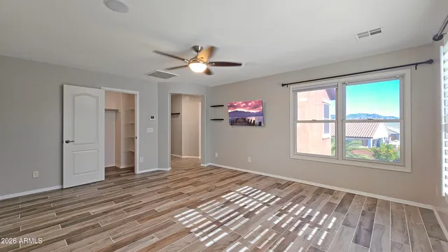 a spacious bathroom with a sink mirror vanity and bathtub