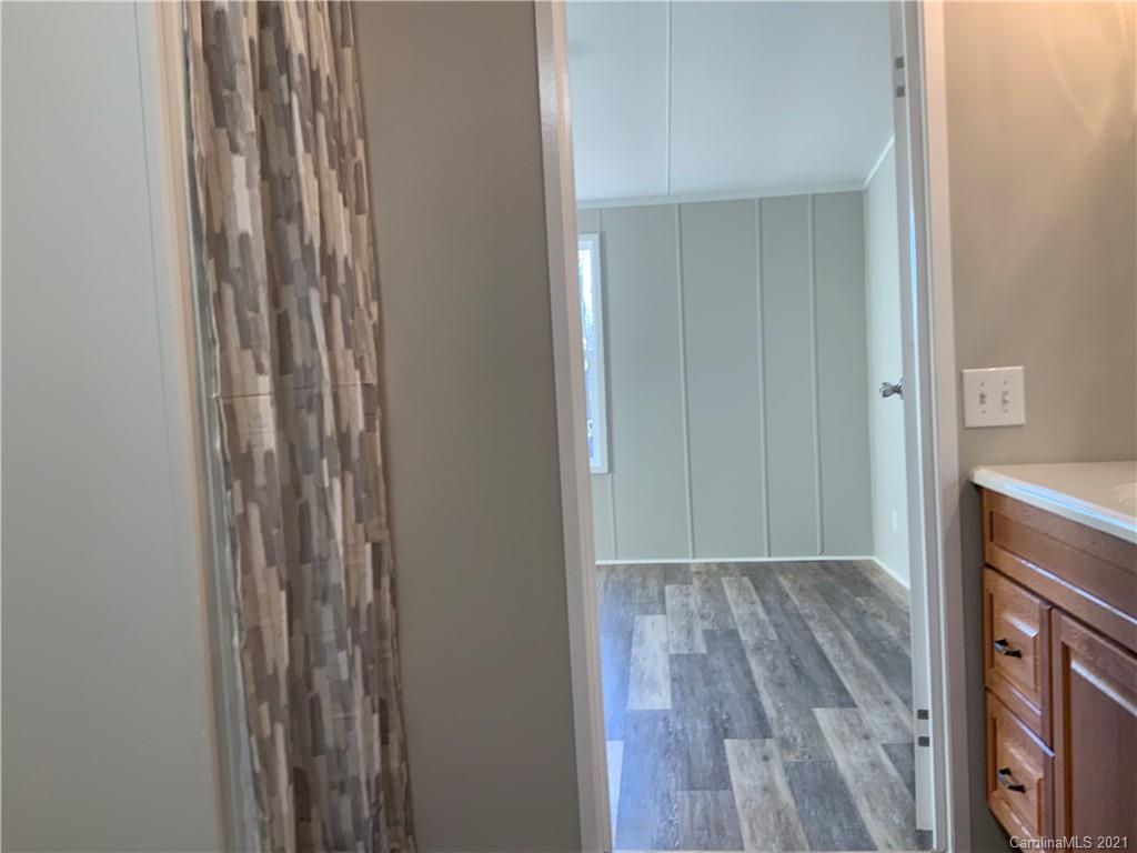 115 Riting Road, Unit 58 Salisbury, NC 28147 - Photo 20 of 23 a view of a room with wooden floor