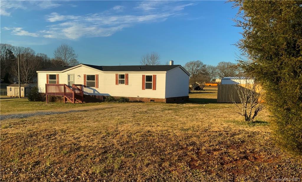 115 Riting Road, Unit 58 Salisbury, NC 28147 - Photo 22 of 23 a front view of a house with a yard