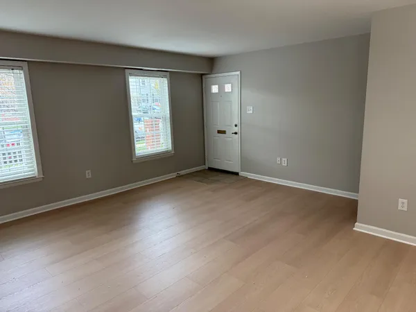 an empty room with windows