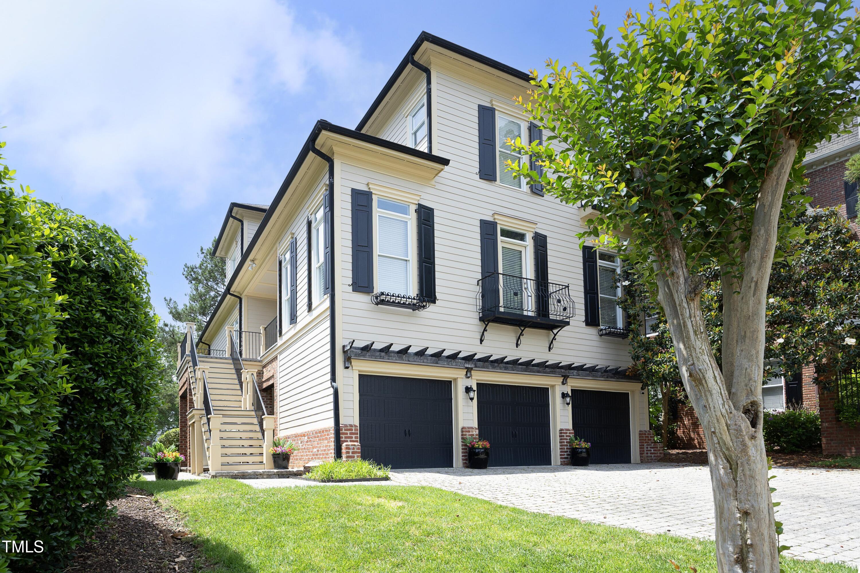 2800 Charleston Oaks Drive Raleigh, NC 27614 - Photo 1 of 53 a front view of a house with a garden and yard