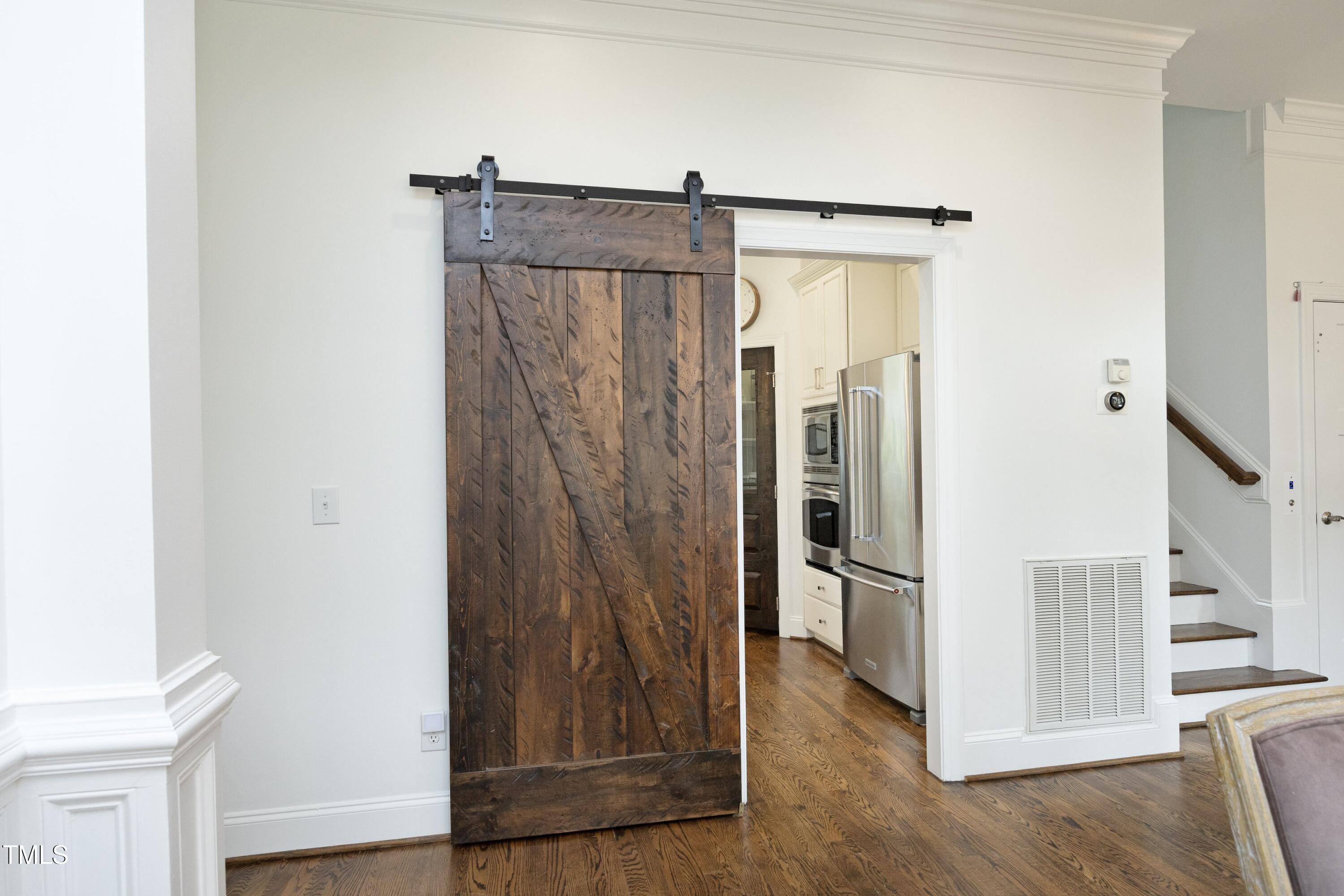 2800 Charleston Oaks Drive Raleigh, NC 27614 - Photo 18 of 53 a view of entryway with wooden floor and stairs