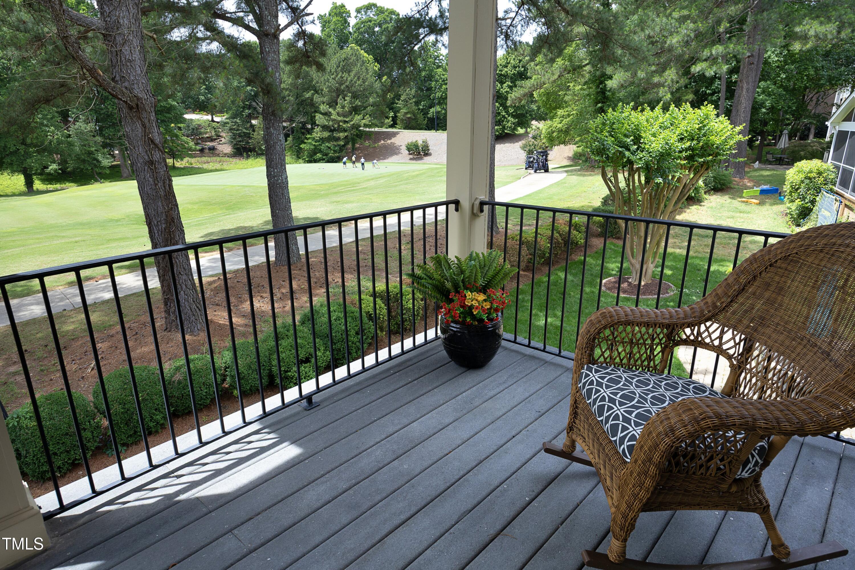 2800 Charleston Oaks Drive Raleigh, NC 27614 - Photo 29 of 53 a view of a balcony with wooden floor
