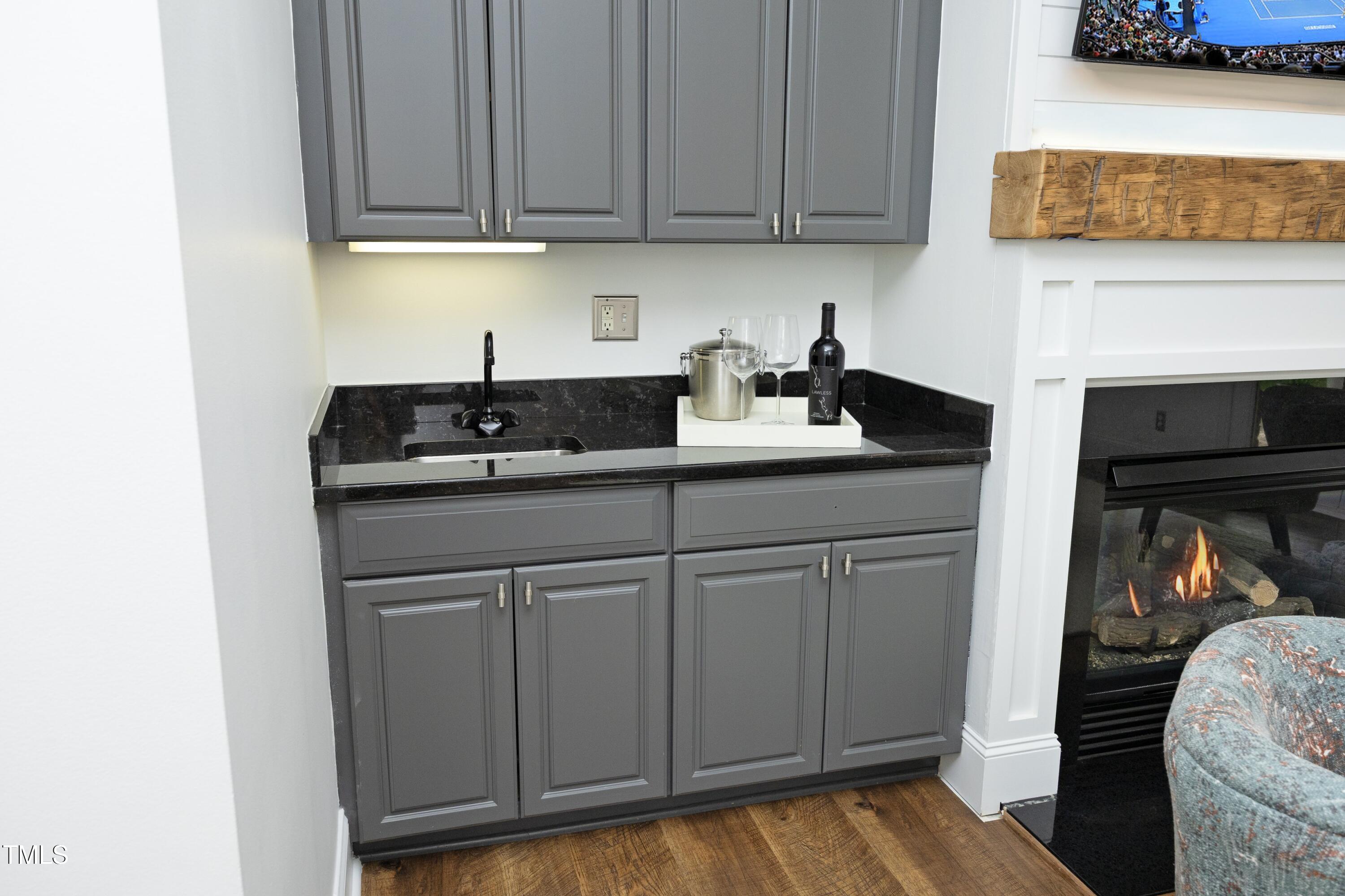 2800 Charleston Oaks Drive Raleigh, NC 27614 - Photo 41 of 53 a kitchen with stainless steel appliances granite countertop a sink stove and cabinets