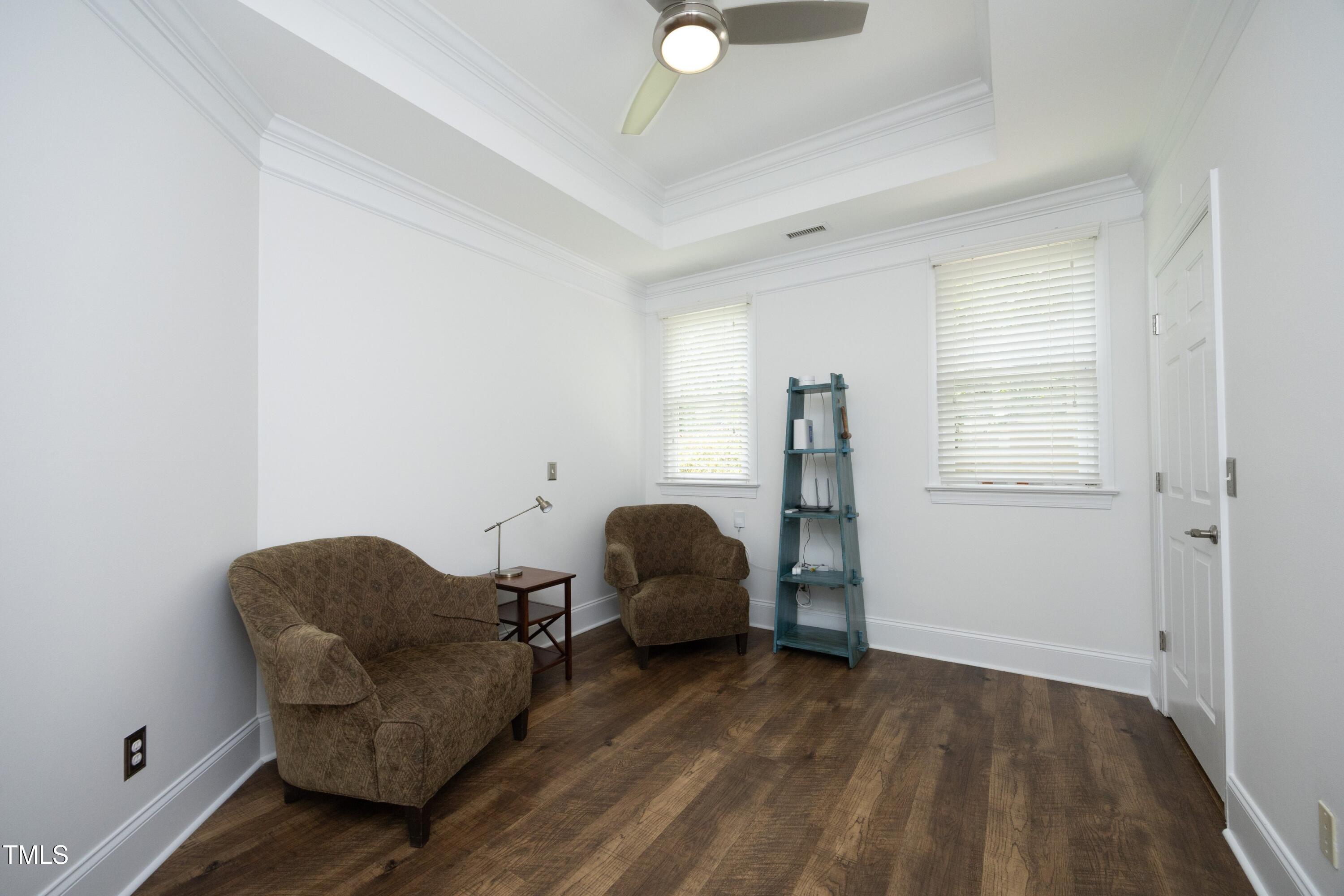 2800 Charleston Oaks Drive Raleigh, NC 27614 - Photo 42 of 53 a room with a couch and a window