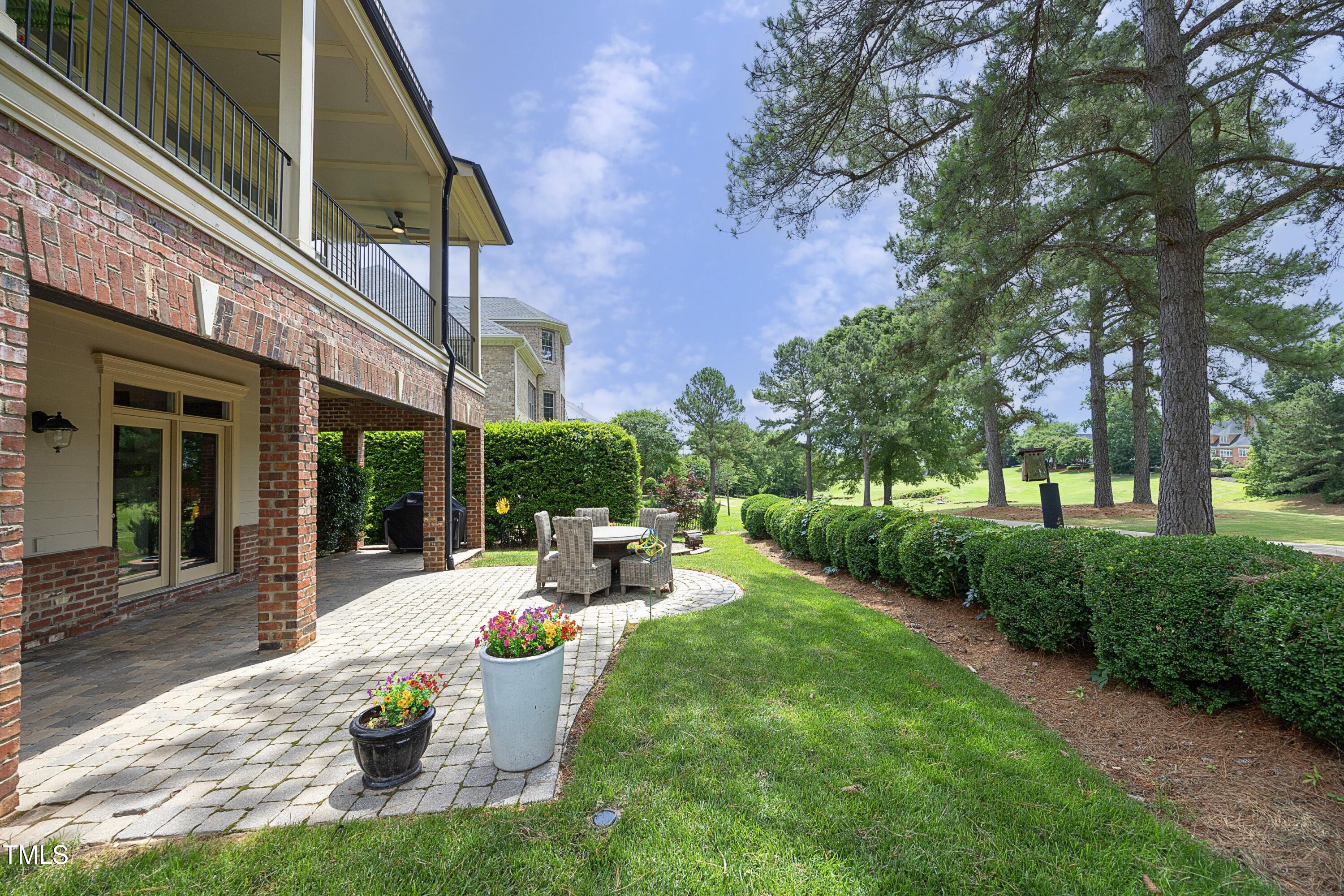 2800 Charleston Oaks Drive Raleigh, NC 27614 - Photo 46 of 53 a view of a house with backyard sitting area and garden