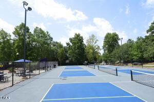 2800 Charleston Oaks Drive Raleigh, NC 27614 - Photo 52 of 53 a view of outdoor space and tennis court
