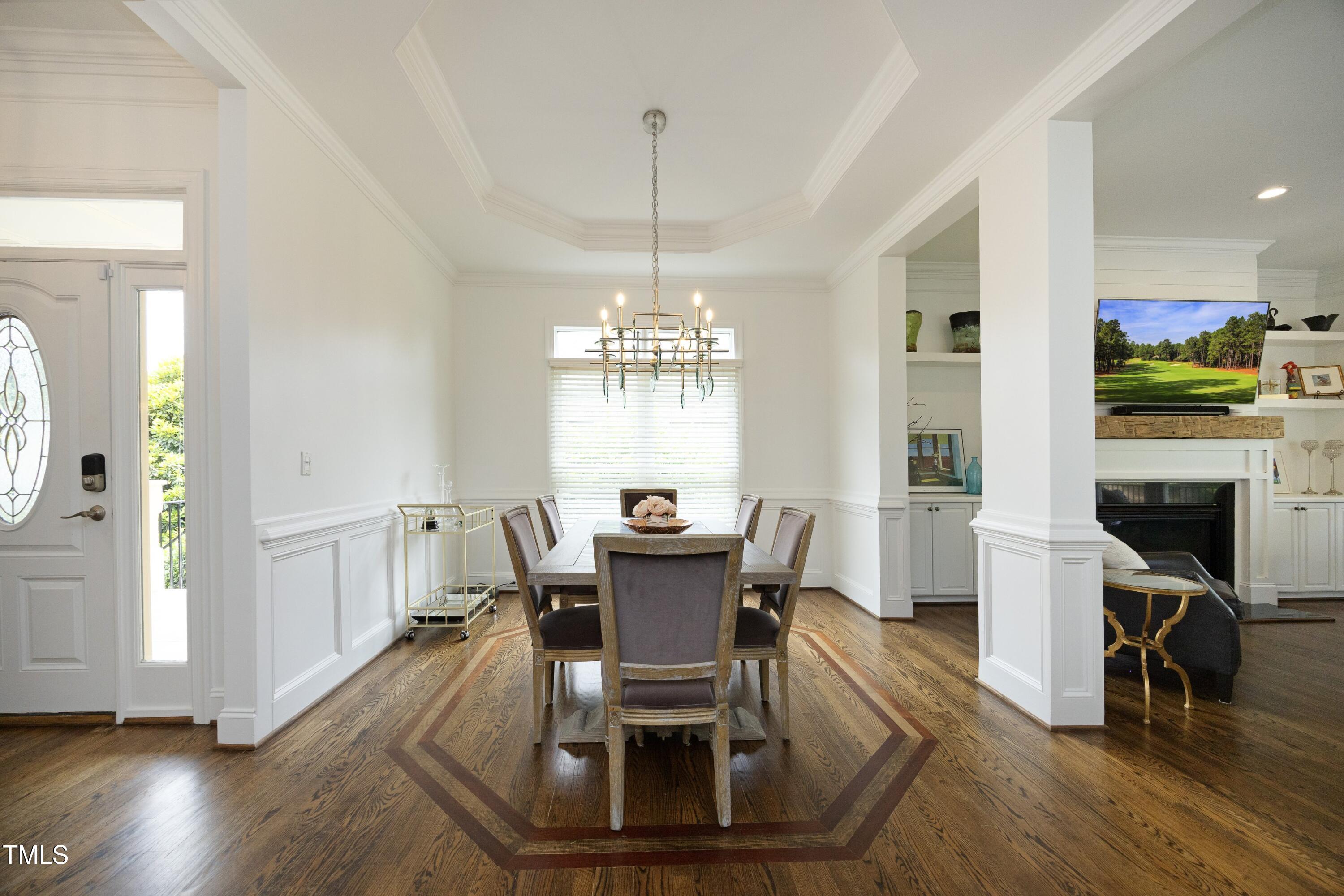 2800 Charleston Oaks Drive Raleigh, NC 27614 - Photo 7 of 53 a view of a dining room with furniture window and wooden floor