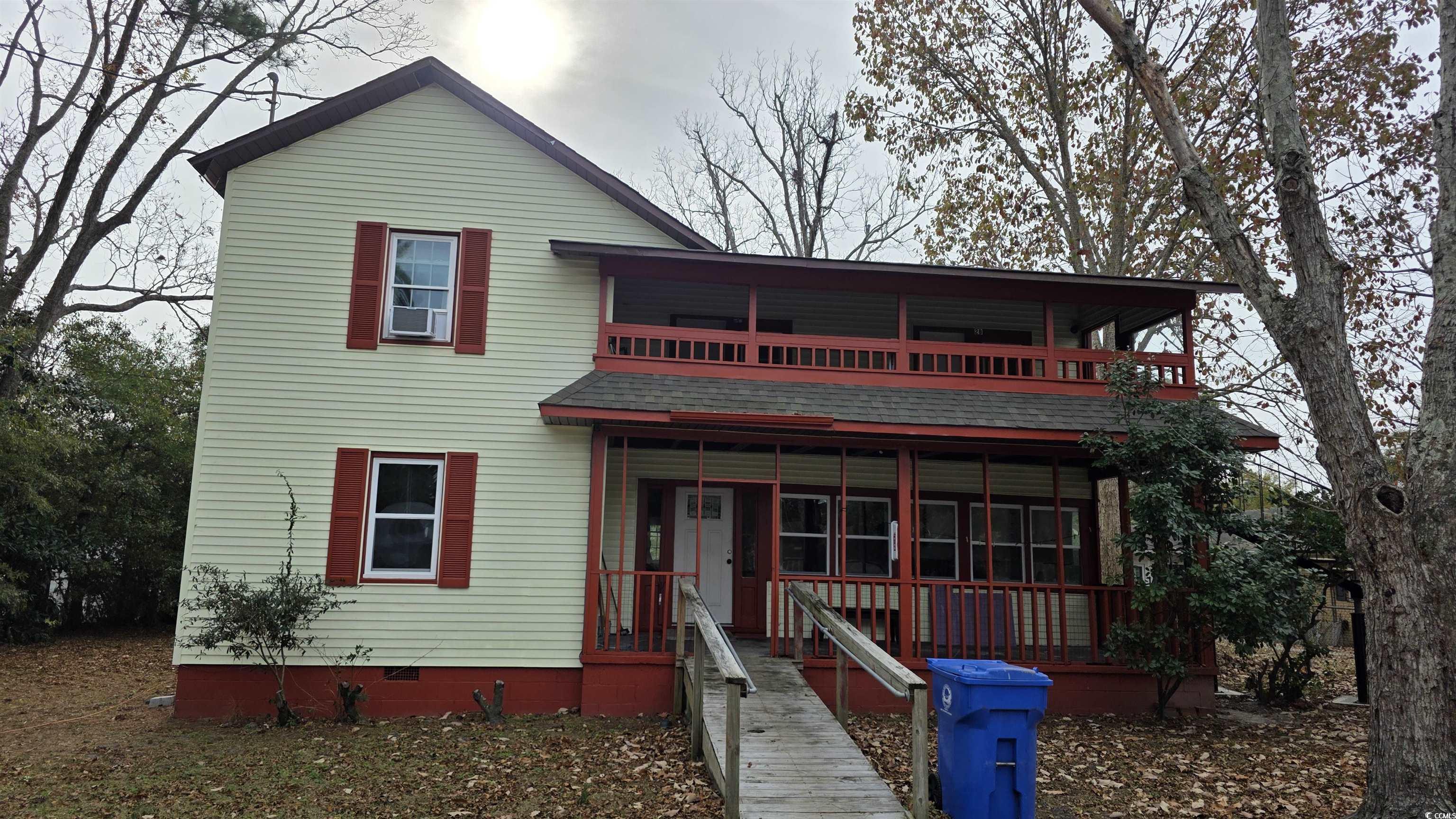665 Martin Street Myrtle Beach, SC 29577 - Photo 3 of 7 View of front facade with a porch and a shingled roof
