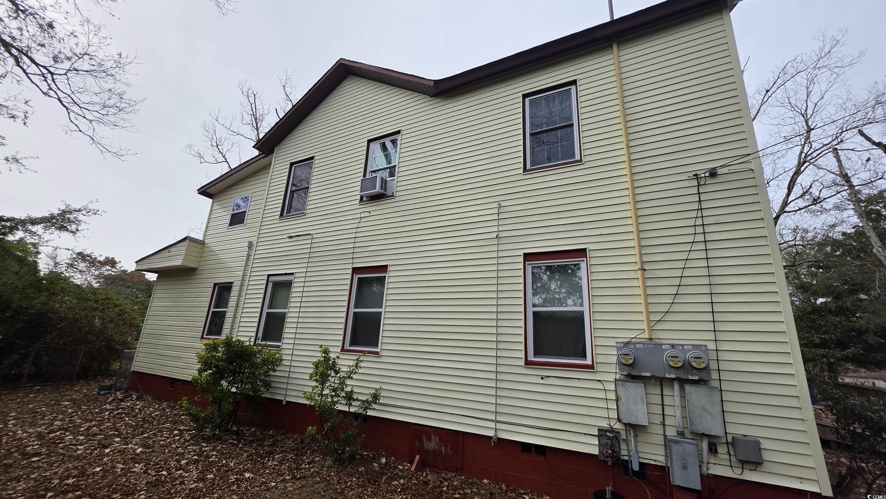 665 Martin Street Myrtle Beach, SC 29577 - Photo 4 of 7 View of side of property featuring crawl space