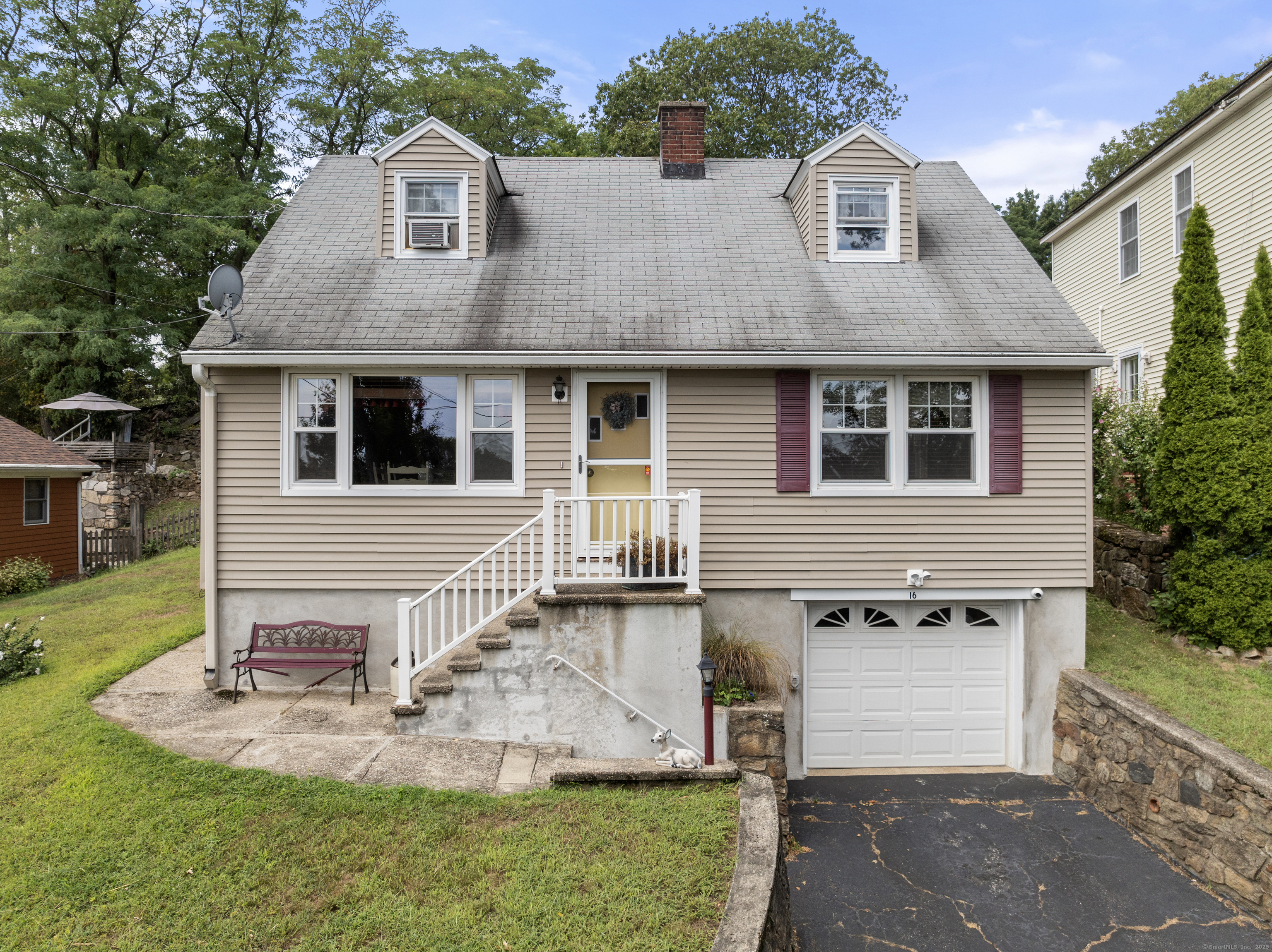16 Exchange Place Fairfield, CT 06825 - Photo 1 of 1 a front view of a house with a yard