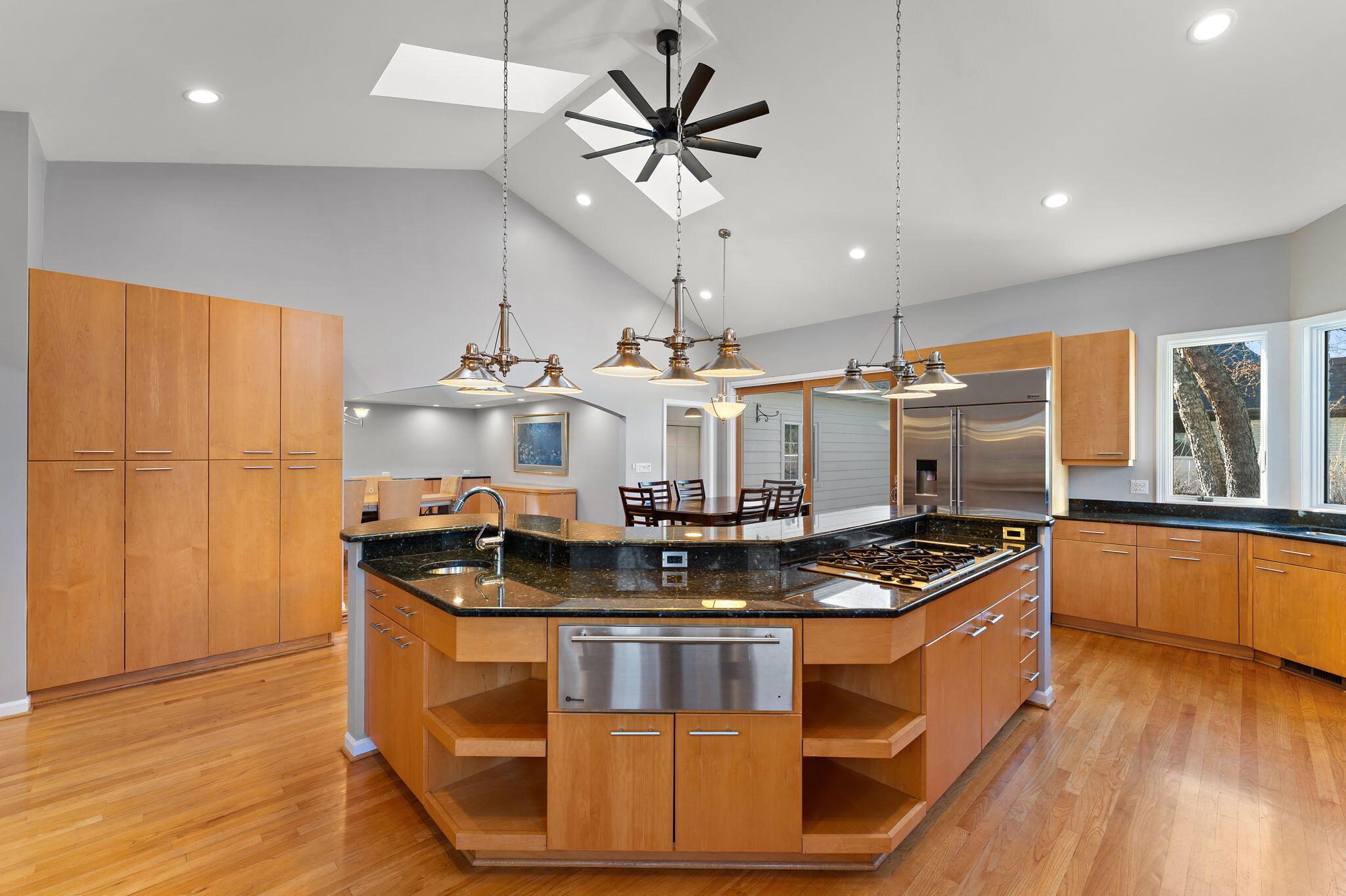 1841 Lambert Lane Munster, IN 46321 - Photo 16 of 66 a kitchen with stainless steel appliances granite countertop a sink a stove and a refrigerator