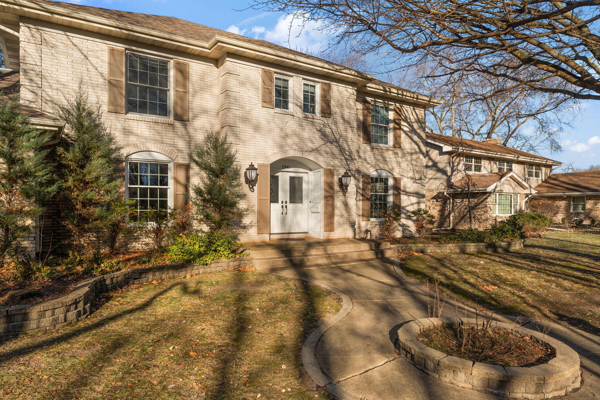 1841 Lambert Lane Munster, IN 46321 - Photo 3 of 66 a front view of a house with a yard