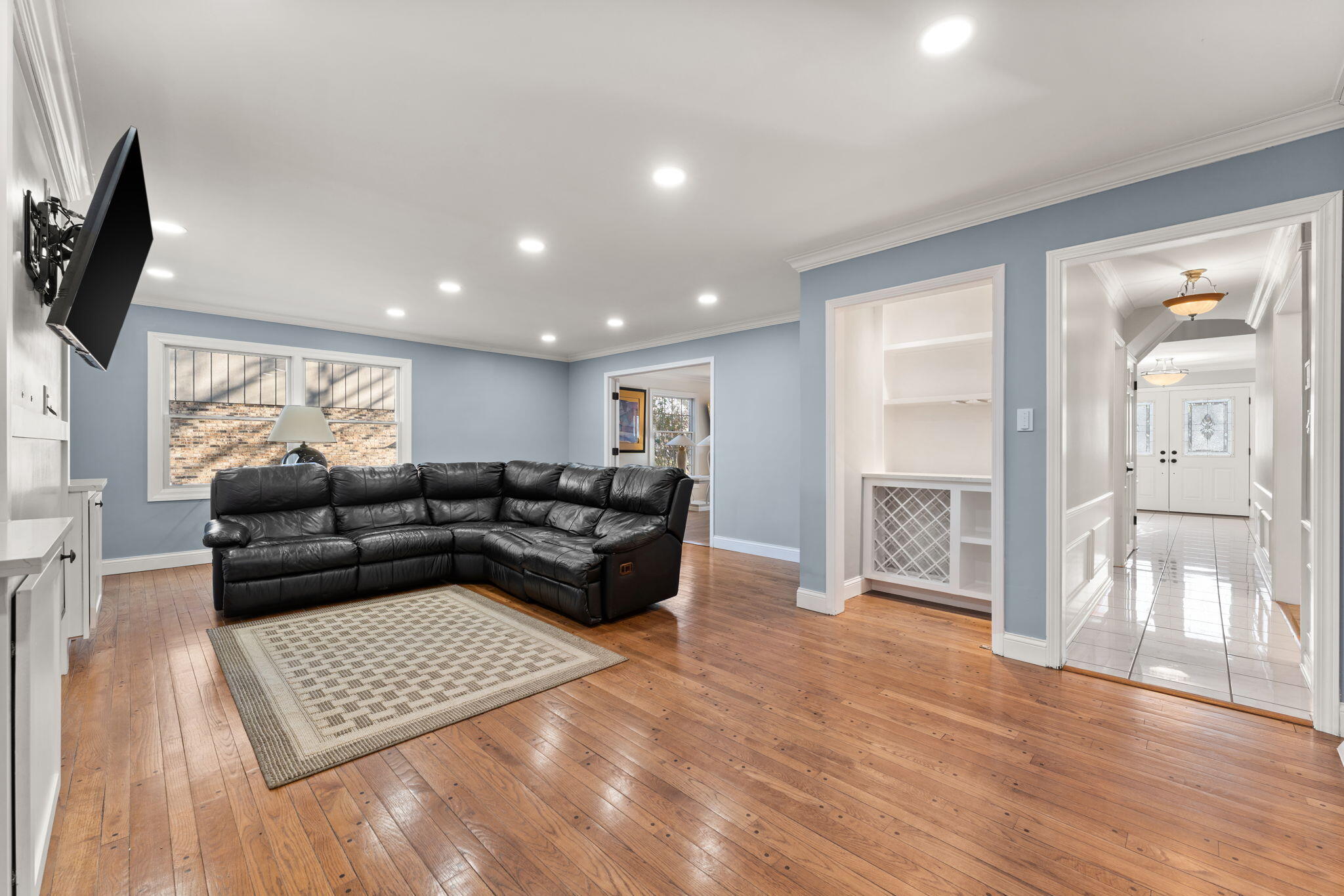 1841 Lambert Lane Munster, IN 46321 - Photo 38 of 66 a living room with furniture fireplace and a flat screen tv